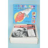 A vintage 'Give-A-Show Projector' with slides including Noddy,