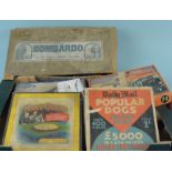 A box of vintage games and jigsaw puzzles including Peall's Bombardo Pool,