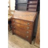 A mid 19th Century mahogany four drawer bureau on splayed feet and fitted interior