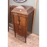 A 1920's mahogany cased wind up gramophone cabinet with 78 records below