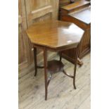 An Edwardian inlaid mahogany octagonal topped table