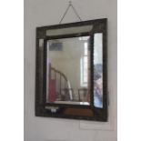 A late 19th Century continental brass framed five paned mirror