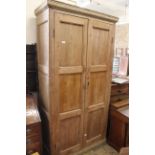 A 19th Century pine two door linen cupboard, approx.