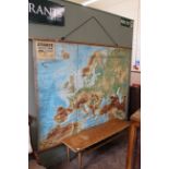 A large vintage school wall map of Europe with mountain ranges,