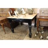 A late 19th Century pine kitchen table with drawer,