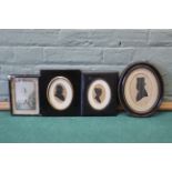 Three silhouettes and a Queen Victoria Baxter print
