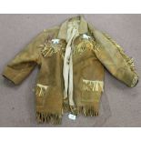 A vintage leather with beadwork wolves Native American style jacket - signs of age and wear,