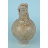 An antique German salt glaze stoneware Bellarmine jug (as found)
