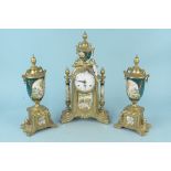 An ornate Italian ''Imperial" clock garniture, brass with ceramic decoration, key wind mechanism,