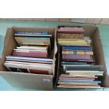Four well filled boxes of books on calligraphy, heraldry,