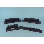 Four train figures modelled from coal to include 'The Royal Scot', 'LMS Black Fire',