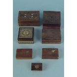 A selection of inlaid wooden boxes of varying sizes