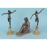 A pair of Art Nouveau style spelter figures on marble style bases,
