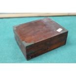 A mid 19th Century rosewood military style brass mounted box with drawer