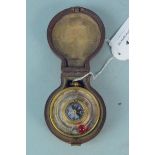 A double sided early 20th Century barometer and thermometer compass in twin lidded leather case