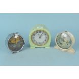 Three vintage Smiths desk clocks, one with farm scene and one with fishing scene
