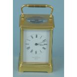 An early 20th Century brass carriage clock with key, dial marked 'Examined by Barraudx Lunds, I.