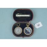 A late 19th Century Negretti & Zambra leather cased travelling barometer,