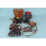 Two pairs of cased binoculars and two vintage cameras