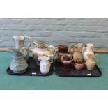 Five late 19th Century moulded stoneware jugs plus a large Pratt type jug and Doulton jugs etc