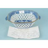 An early 19th Century English blue and white pottery chestnut basket with Greek pattern transfers