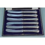 A cased set of six silver handled butter knives