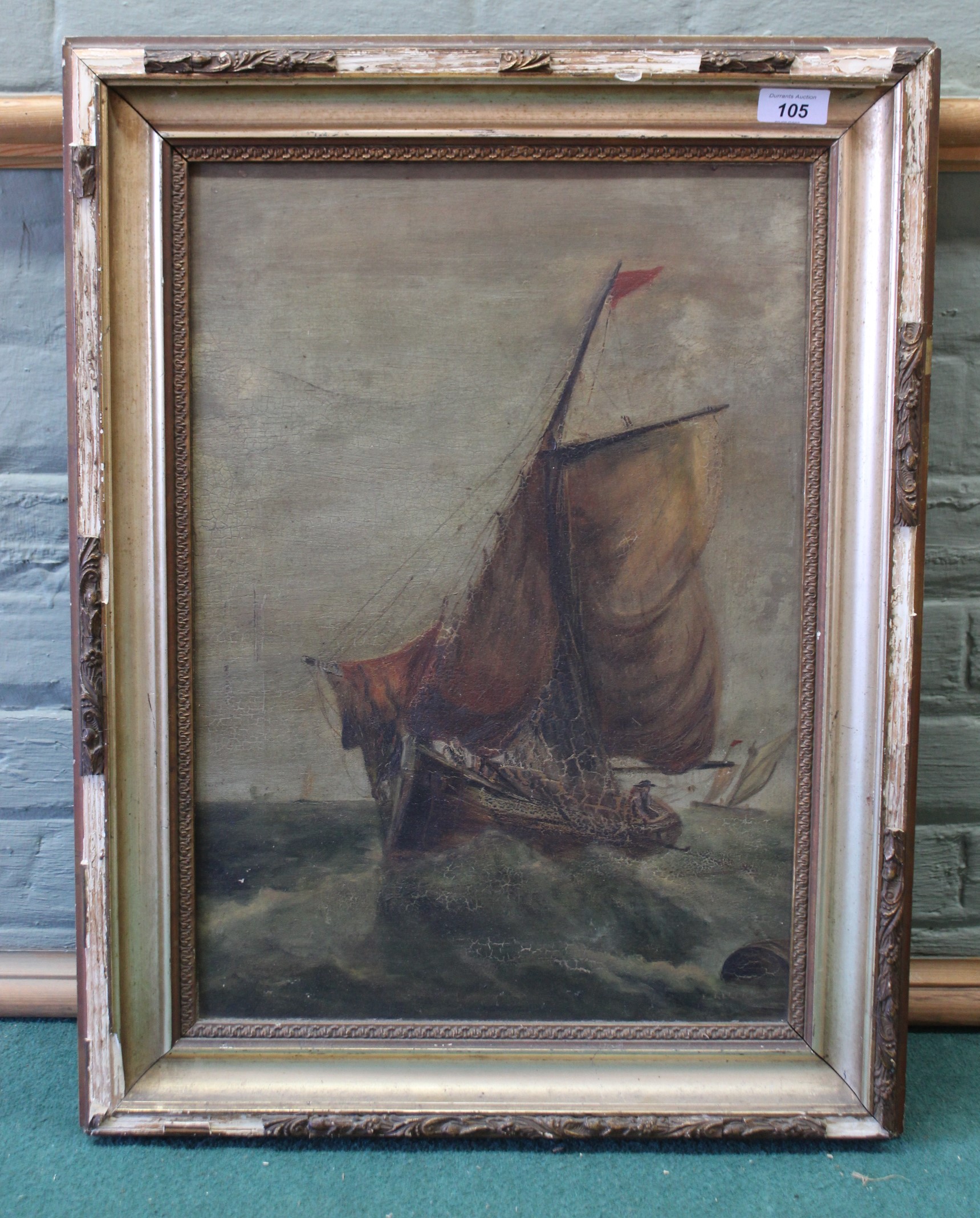 An indistinctly signed oil on canvas of a fishing boat at sea 19th Century,