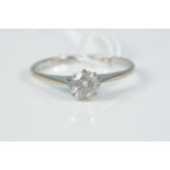 An 18ct gold solitaire diamond ring, diamond approx 0.