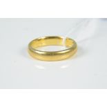 A 22ct gold wedding band, size N, weight approx 5.