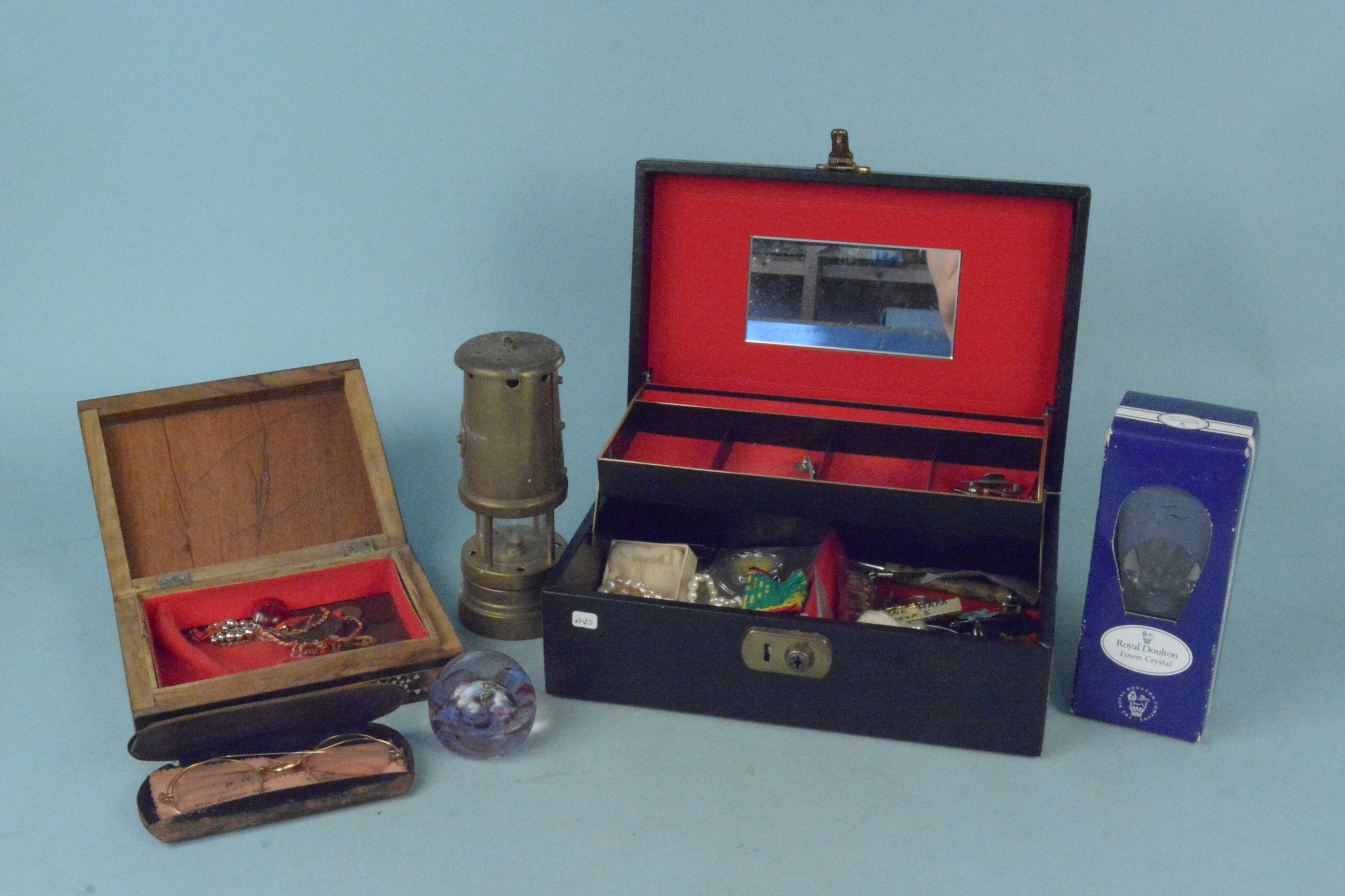 A mixed lot of costume jewellery, badges, pen knife, paperweight,
