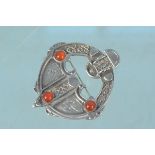 A large Scottish silver abstract design circular brooch set with stones, hallmarked Edinburgh 1976,