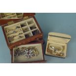 A wooden jewellery box and contents including a 9ct gold and silver ring,