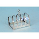 A silver four slice toast rack, hallmarked Sheffield 1937, makers Viners Ltd,