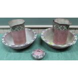 Two pairs of early 20th Century wash bowls and jugs in pink finish (staining to body)