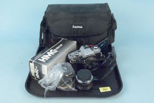 A Minolta X300 35mm camera,