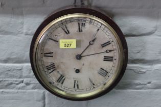 A mahogany round dial wall clock, face marked 'Bristol', with key,