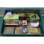 A box of vintage advertising tins