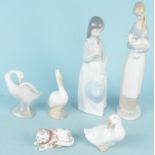 A Lladro and a Nao figurine of girls,