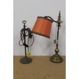 Two 1920's brass adjustable table lamps (these items are sold as collectors items only and have not