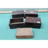 Four late 19th Century mahogany tobacco boxes (three with brass inlay) together with an 'Embassy'