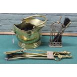 A brass companion set and stand,