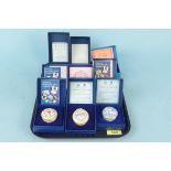 Nine boxed Halcyon Days enamel trinket boxes,