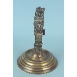 A Victorian brass pub bar top gas lighter of a classical figure with plume hat,