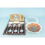 A cased set of soup spoons plus a vaseline glass dish and plate,
