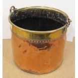 A Victorian copper and brass coal or log bucket with swing handle,