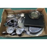 A box of assorted plated ware including cutlery,