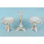 A pair of antique Dresdon hand painted bon bon dishes elaborately decorated with flowers,