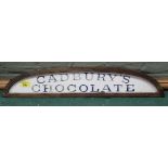 A vintage advertisement sign in mahogany frame for 'Cadbury's Chocolate' (as found)