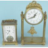 A vintage brass and enamel mantel clock,