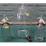 A late 19th Century glass shops dispensing barrel and tap plus two vintage Schweppes soda syphons